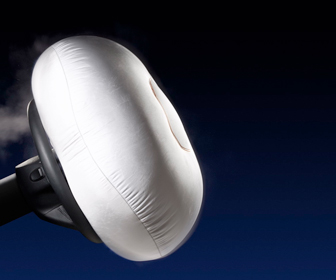 Seat at least 10 inches away from the steering wheel to avoid damages from a deploying airbag